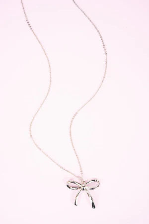 CRYSTAL AVENUE SILVERTONE BOW NECKLACE
