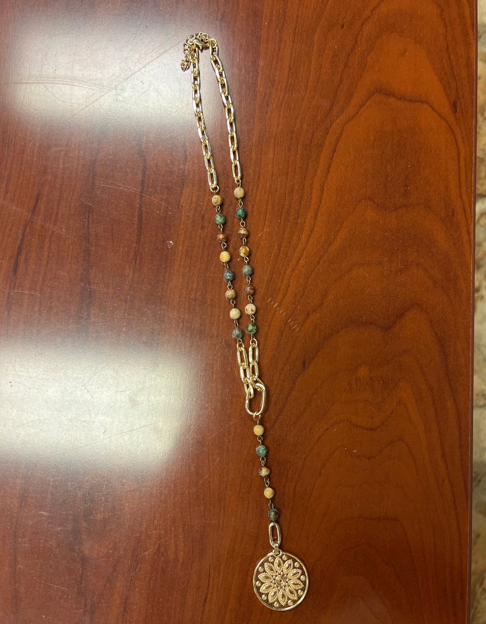 AC multi colored bead and gold link necklace with gold pendant
