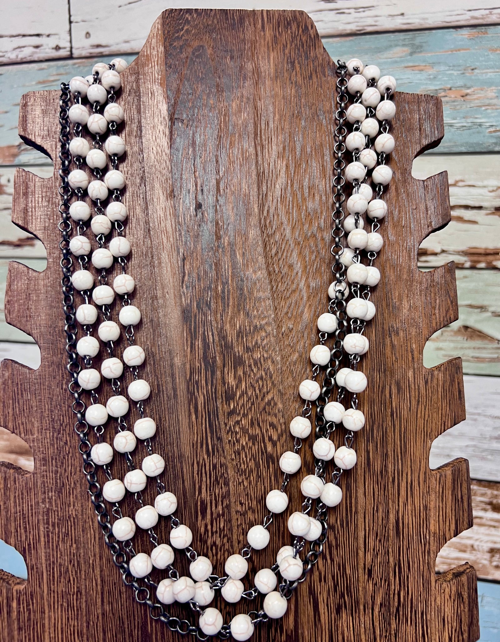 WE 3 strand white stone bead with gunmetal chain necklace