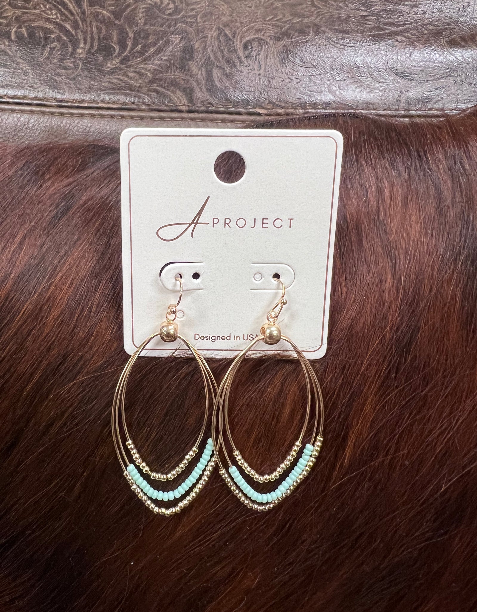 Mint green gold bead earrings