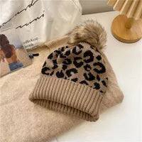 NI Khaki with black animal print pom beanie