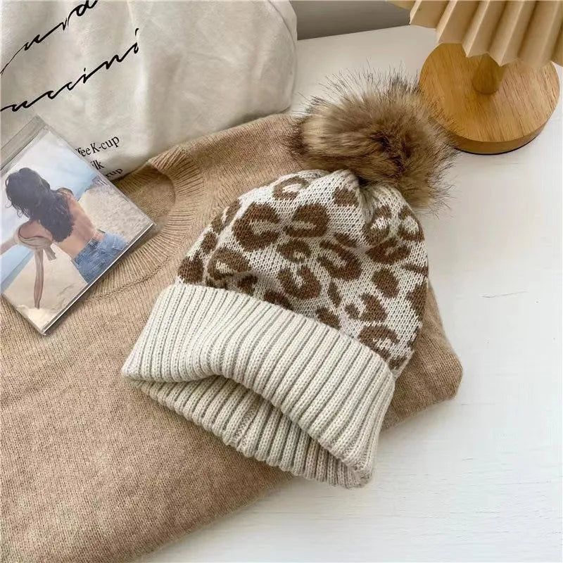 NI Cream with Tan animal print pom beanie