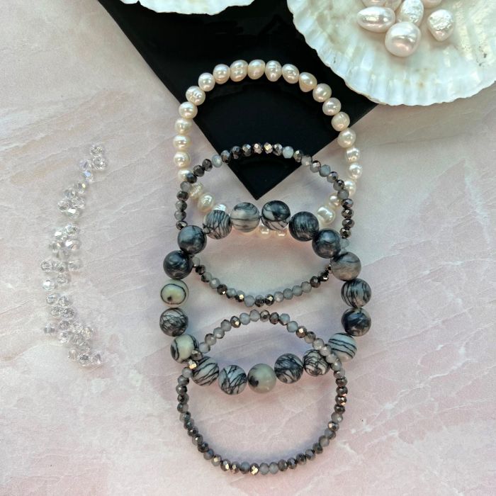 Cultured Pearl and Crystal set of Four Bracelets.