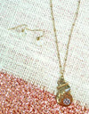 Burnished Goldtone Snowman Necklace